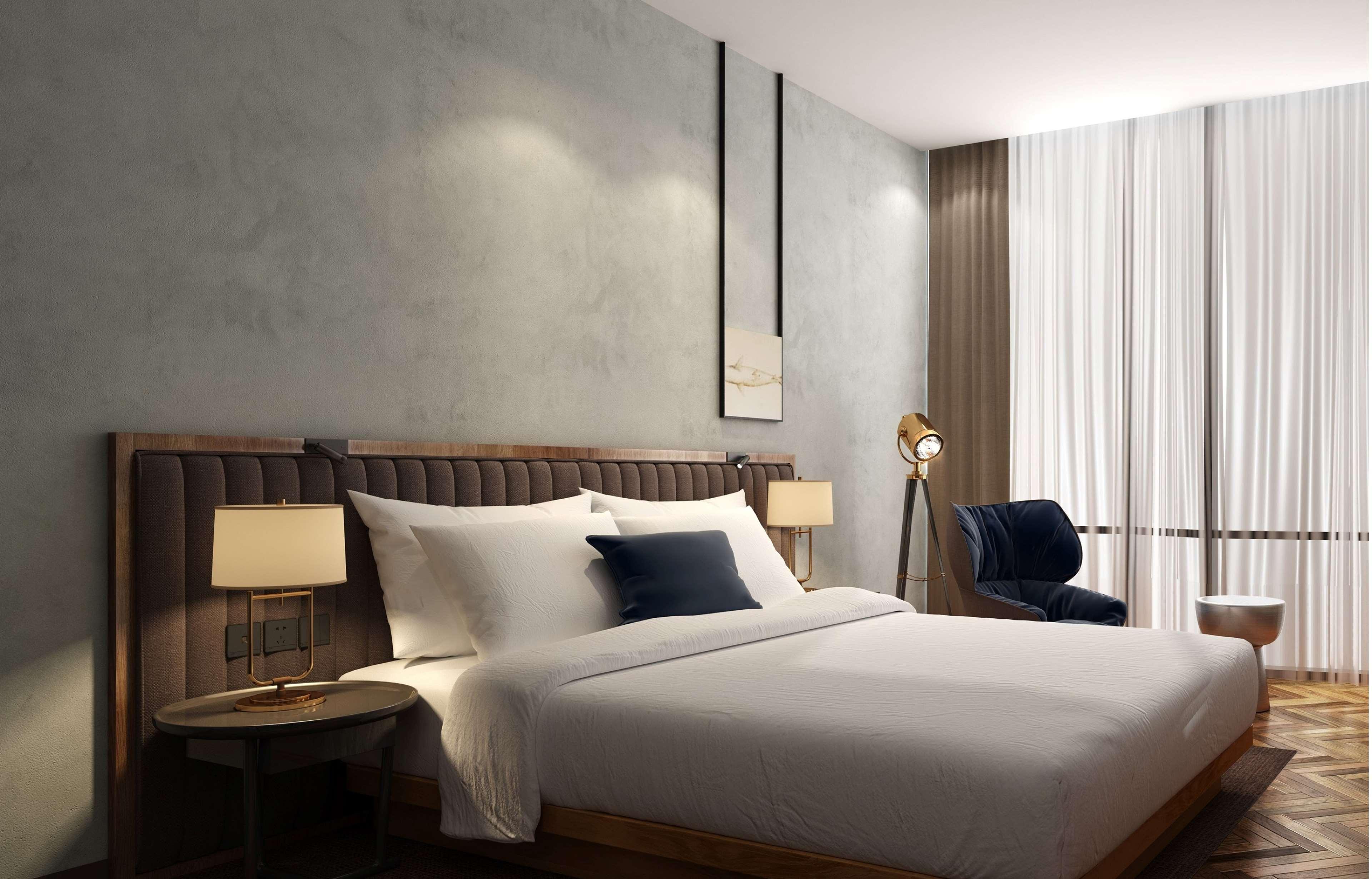 Doubletree By Hilton Dubai M Square Hotel & Residences Exterior photo A bedroom