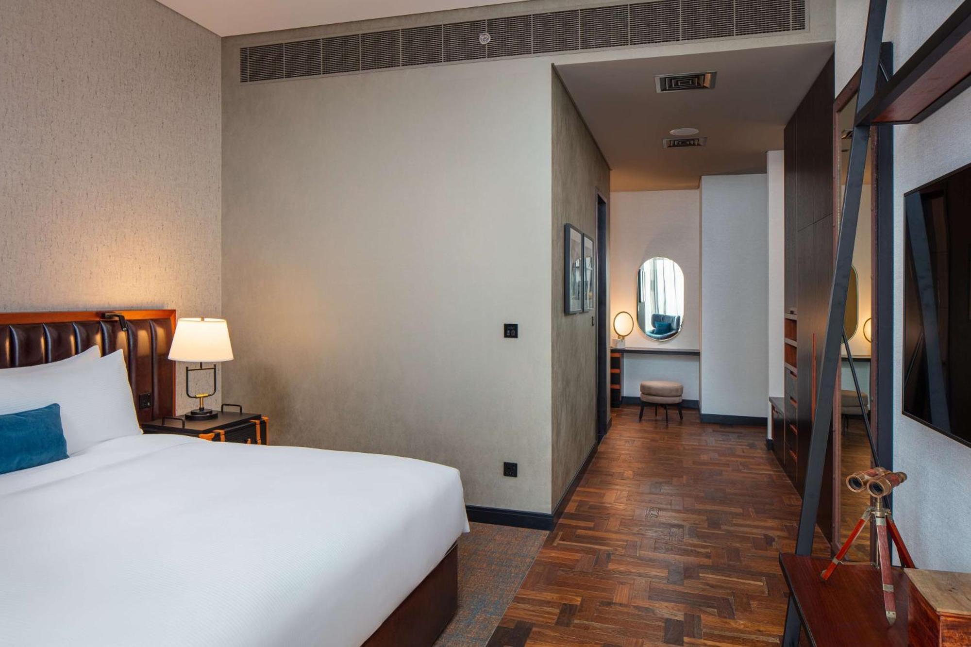 Doubletree By Hilton Dubai M Square Hotel & Residences Exterior photo A room at the hotel
