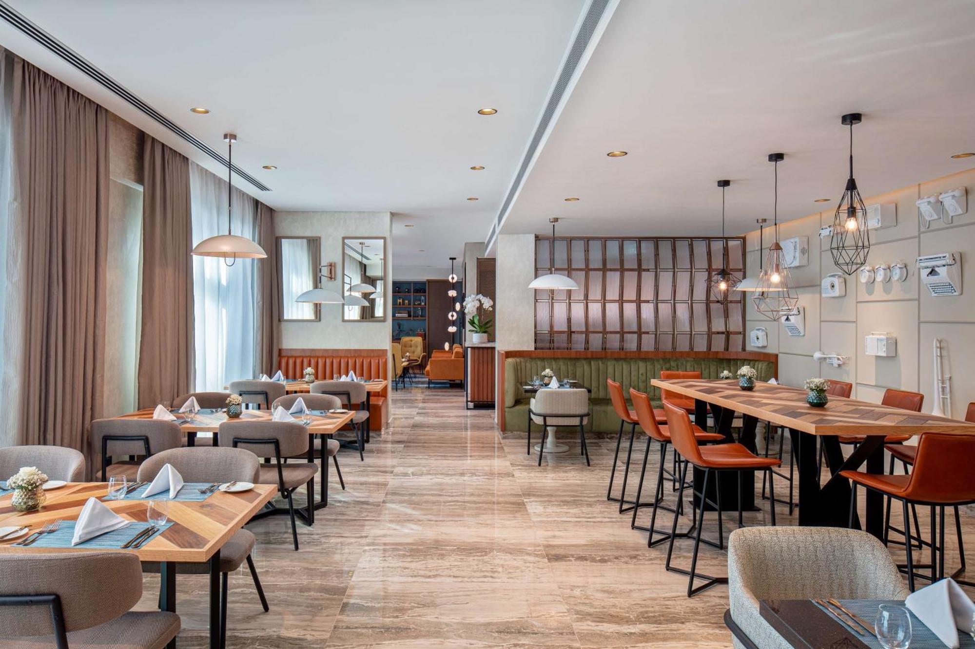 Doubletree By Hilton Dubai M Square Hotel & Residences Exterior photo The restaurant