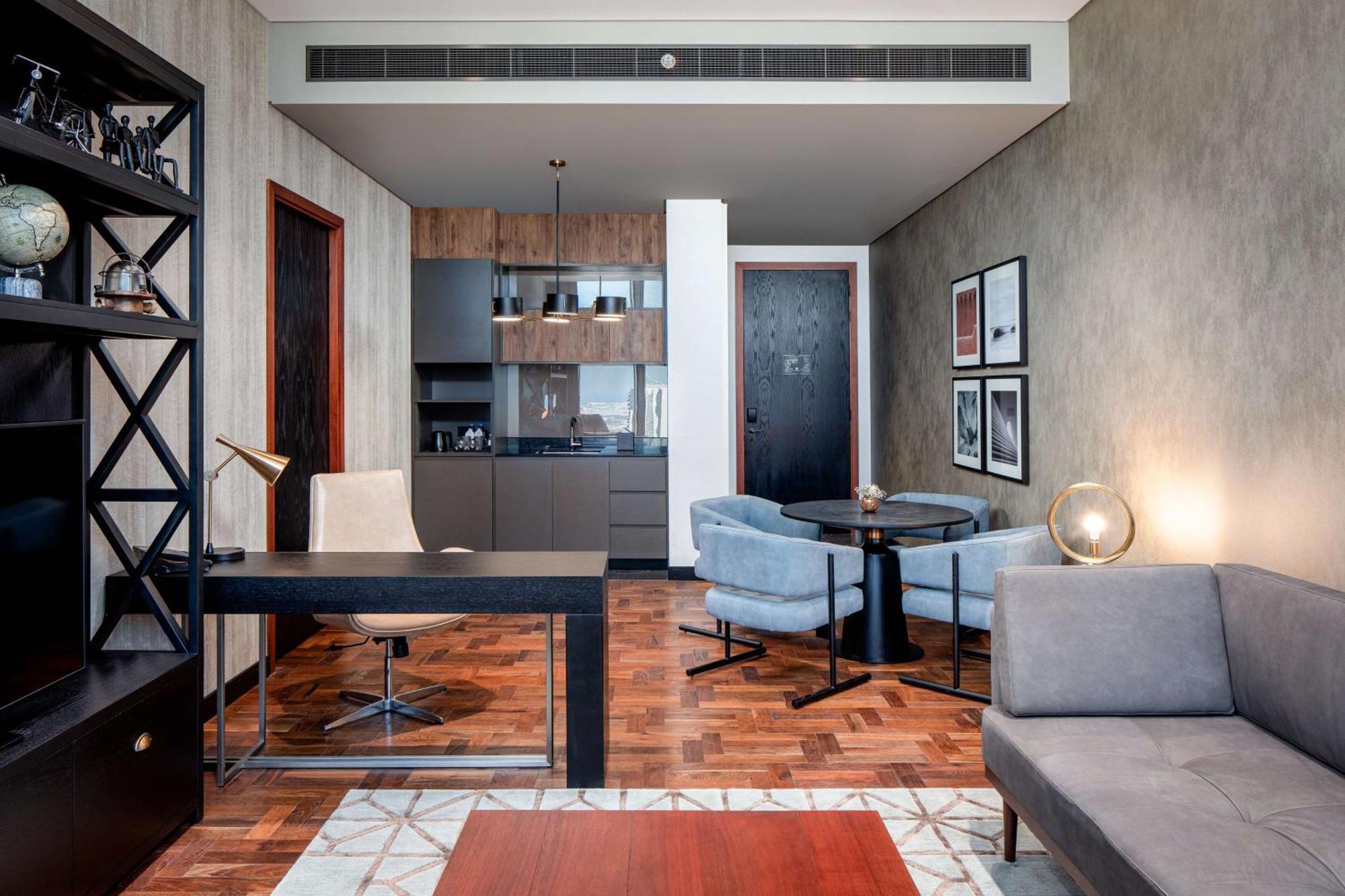 Doubletree By Hilton Dubai M Square Hotel & Residences Exterior photo A suite at the hotel