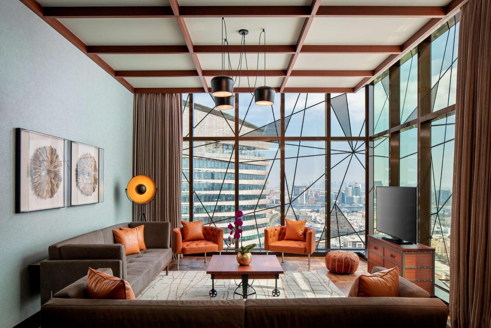 Doubletree By Hilton Dubai M Square Hotel & Residences Exterior photo Living room