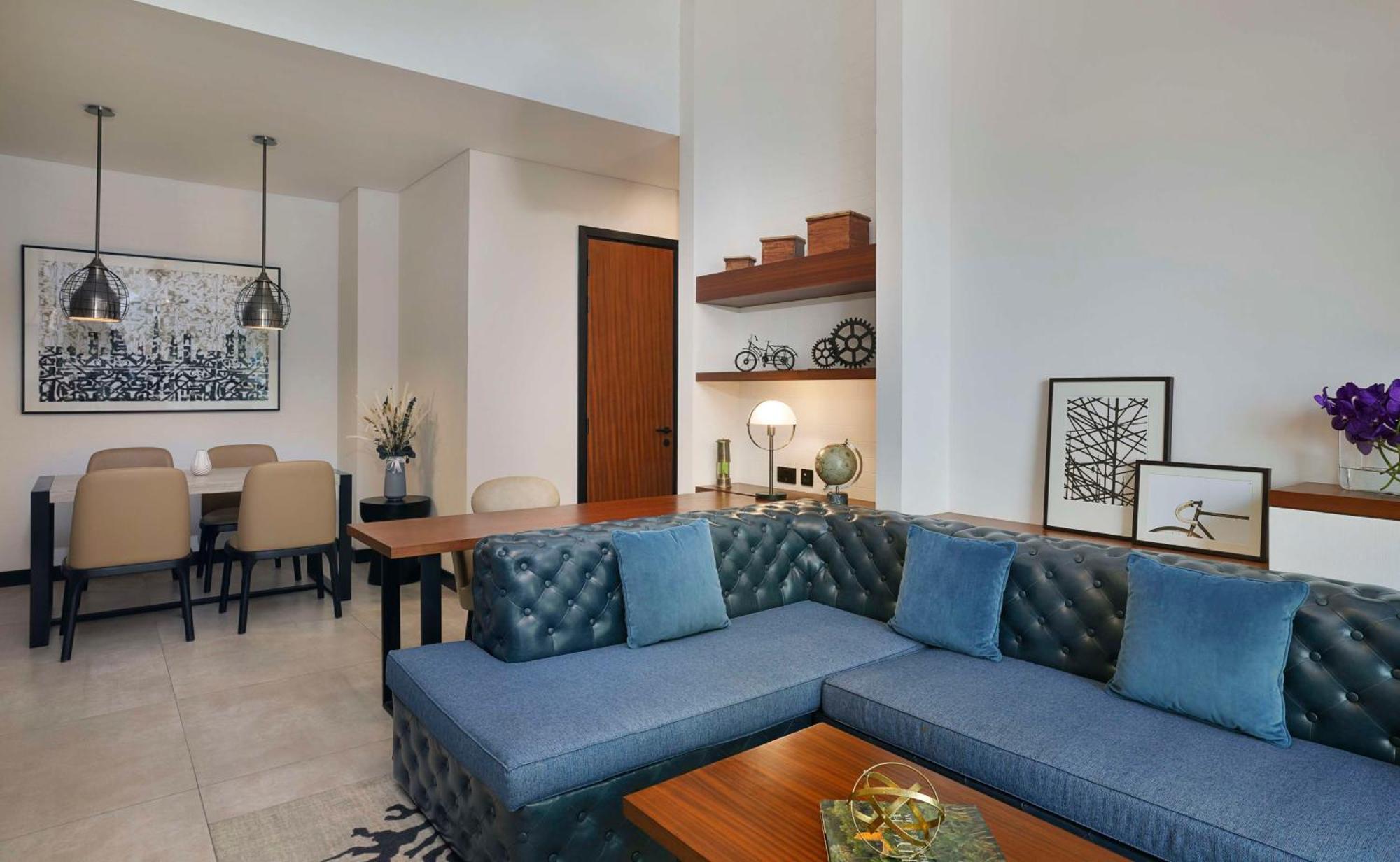 Doubletree By Hilton Dubai M Square Hotel & Residences Exterior photo A living room at the hotel