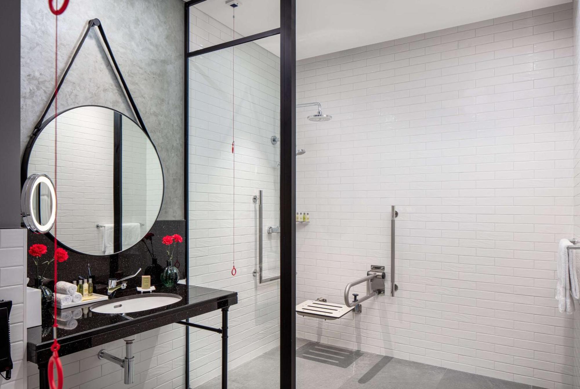 Doubletree By Hilton Dubai M Square Hotel & Residences Exterior photo Bathroom of a hotel room
