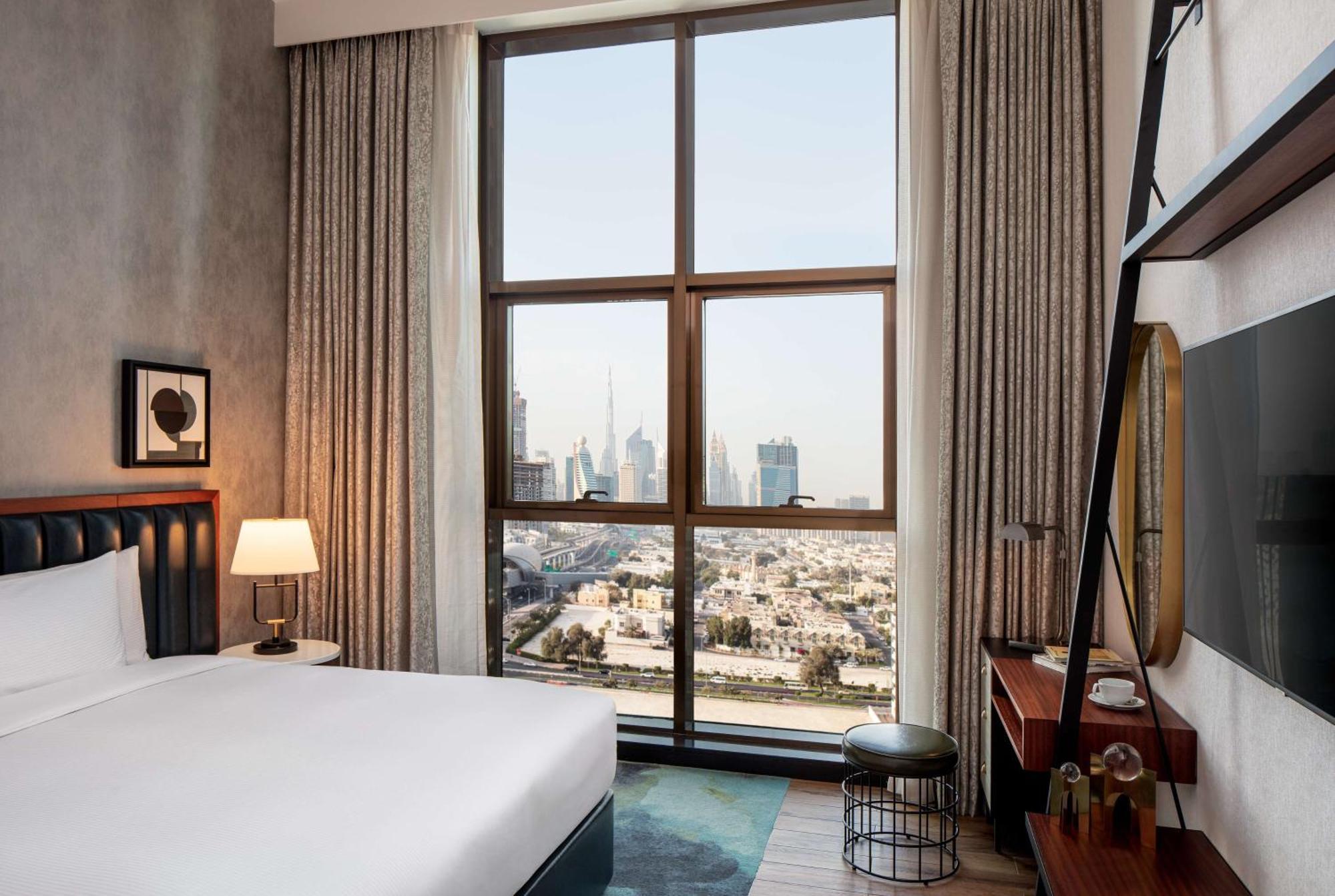 Doubletree By Hilton Dubai M Square Hotel & Residences Exterior photo A guest room at the hotel