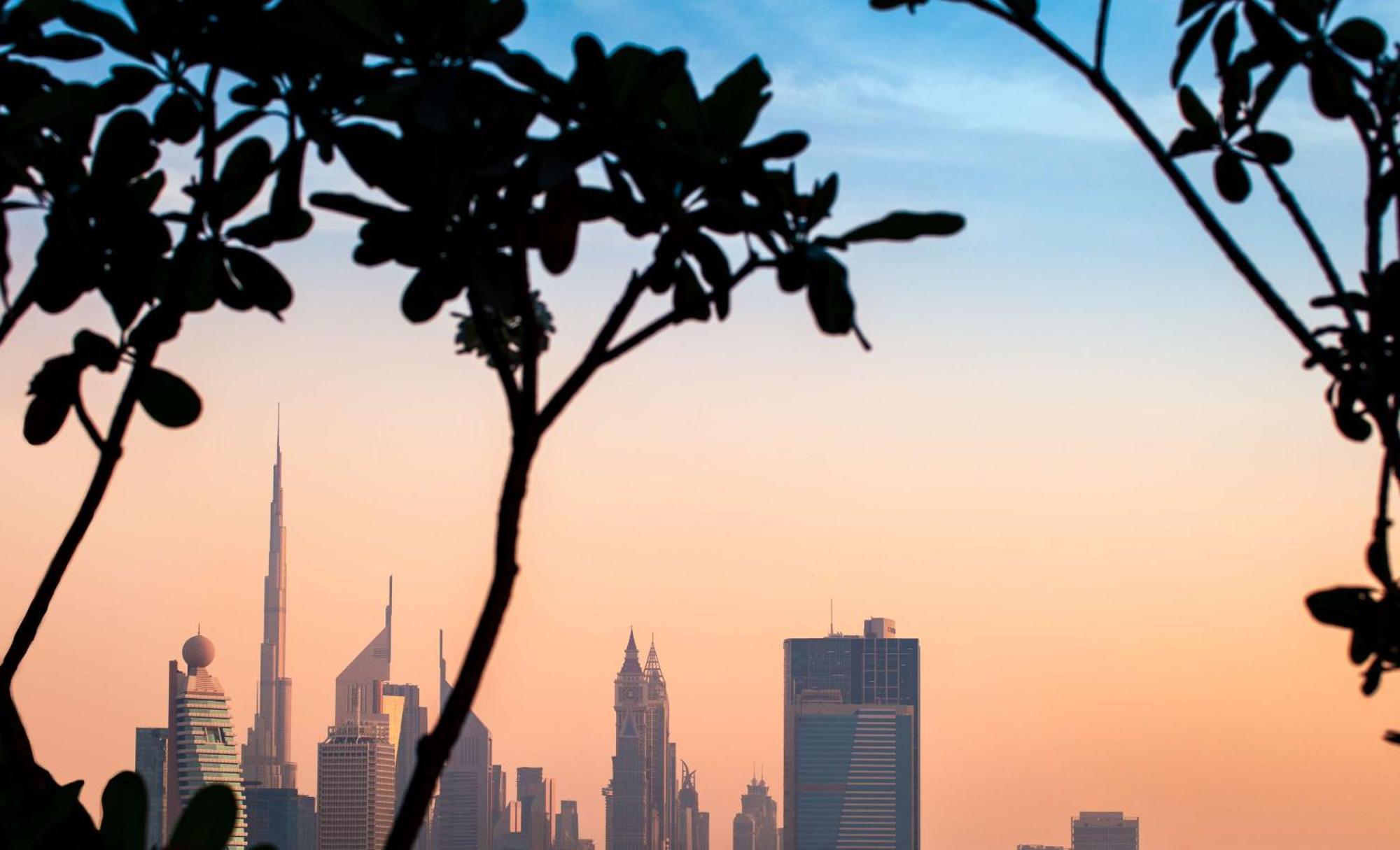 Doubletree By Hilton Dubai M Square Hotel & Residences Exterior photo Dubai skyline